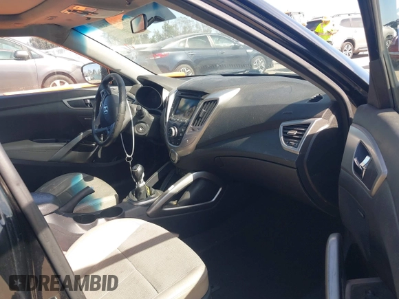 2013 Hyundai Veloster w/Black Int with VIN KMHTC6AD4DU132701, listed as a IAAI auction lot 42021759 with 102,840 mi miles and . Bid and sale history available at DreamBid. Image 5.