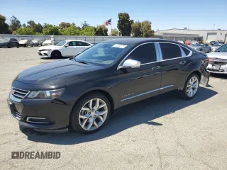 2016 Chevrolet Impala LTZ with VIN 2G1145S33G9158743, listed as a Copart auction lot 61000525 with 105,326 mi miles and Salvage title. Bid and sale history available at DreamBid. Image 1.