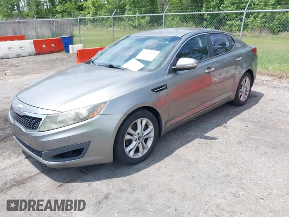 2013 Kia Optima LX with VIN 5XXGM4A77DG161195, listed as a IAAI auction lot 42241468 with 291,814 mi miles and . Bid and sale history available at carsss.com. Image 2.