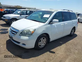 2007 Honda Odyssey EX with VIN 5FNRL38487B075936, listed as a IAAI auction lot 42052061 with 188,279 mi miles and . Bid and sale history available at DreamBid. Image 2.