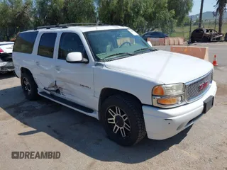 2006 GMC Yukon XL Denali with VIN 1GKFK66U06J132913, listed as a IAAI auction lot 41988097 with 186,738 mi miles. Bid and sale history available at carsss.com. Image 1.