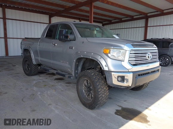 2015 Toyota Tundra Limited with VIN 5TFBW5F14FX424723, listed as a IAAI auction lot 42129929 with 222,060 mi miles and . Bid and sale history available at DreamBid. Image 1.