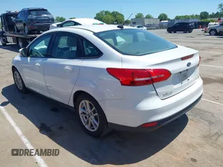 2017 Ford Focus SE with VIN 1FADP3F29HL234323, listed as a IAAI auction lot 42143821 with 138,860 mi miles. Bid and sale history available at carsss.com. Image 3.