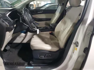 2015 Ford Edge Titanium z VIN 2FMTK3K91FBB08263, wystawiony jako Copart lot #55448405 z przebiegiem 135 788 mil mil oraz Szkoda całkowita • Salvage title. Historia ofert i sprzedaży dostępna na DreamBid. Obrazek 7.
