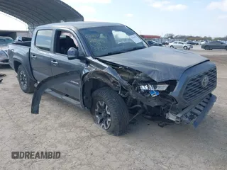 2021 Toyota Tacoma 4WD SR with VIN 3TMCZ5AN4MM387519, listed as a IAAI auction lot 41769922 with 61,813 mi miles. Bid and sale history available at carsss.com. Image 1.