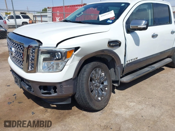 2017 Nissan Titan SV with VIN 1N6AA1E5XHN532587, listed as a IAAI auction lot 42019155 with 90,496 mi miles and . Bid and sale history available at DreamBid. Image 6.