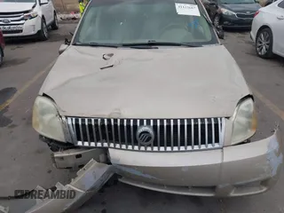 2005 Mercury Montego Luxury z VIN 1MEFM40185G611793, wystawiony jako IAAI lot #41125667 z przebiegiem Nie podano mil oraz . Historia ofert i sprzedaży dostępna na DreamBid. Obrazek 12.