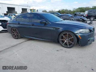2013 BMW M5 with VIN WBSFV9C59DD096774, listed as a IAAI auction lot 41608286 with 82,601 mi miles. Bid and sale history available at carsss.com. Image 1.