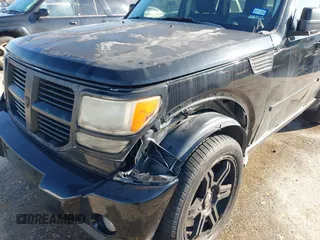 2007 Dodge Nitro SLT with VIN 1D8GT58K97W666680, listed as a IAAI auction lot 41573904 with 171,795 mi miles. Bid and sale history available at carsss.com. Image 6.