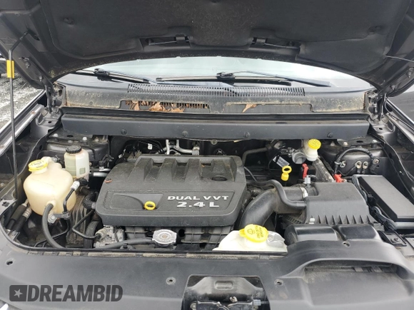 2015 Dodge Journey American Value z VIN 3C4PDCAB6FT649933, wystawiony jako Copart lot #54404415 z przebiegiem 144 830 mil mil oraz Szkoda całkowita • Salvage title. Historia ofert i sprzedaży dostępna na DreamBid. Obrazek 12.
