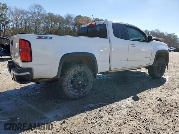 2017 Chevrolet Colorado 4WD Z71 with VIN 1GCHTDENXH1322172, listed as a Copart auction lot 47023125 with 153,022 mi miles and Salvage Title. Bid and sale history available at carsss.com. Image 3.