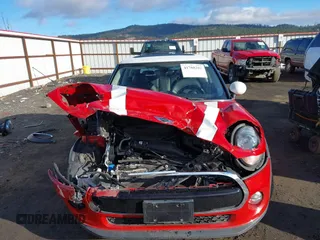 2016 MINI Hardtop with VIN WMWXP5C59G3B15378, listed as a IAAI auction lot 41788202 with 57,873 mi miles and . Bid and sale history available at DreamBid. Image 13.