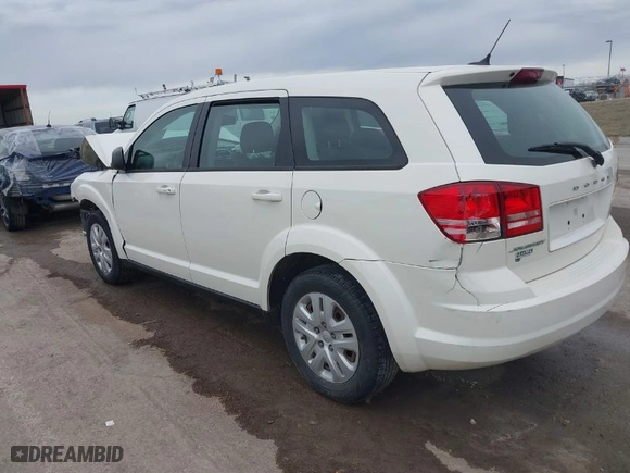 2014 Dodge Journey SE with VIN 3C4PDCAB7ET134454, listed as a IAAI auction lot 41625094 with 145,814 mi miles. Bid and sale history available at carsss.com. Image 3.