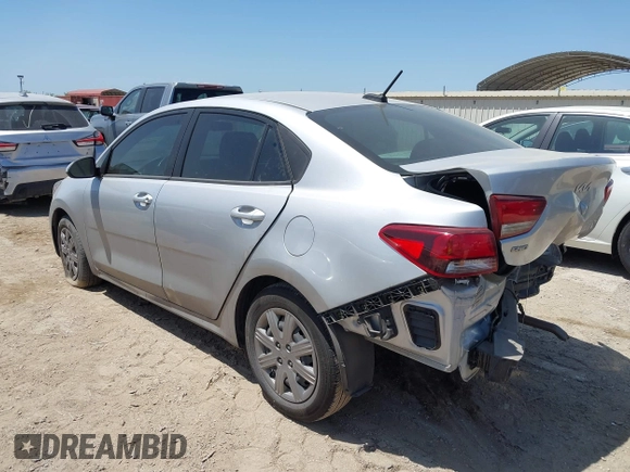 2023 Kia Rio S z VIN 3KPA24AD6PE600384, wystawiony jako IAAI lot #42003099 z przebiegiem 27 001 mil mil oraz . Historia ofert i sprzedaży dostępna na DreamBid. Obrazek 3.