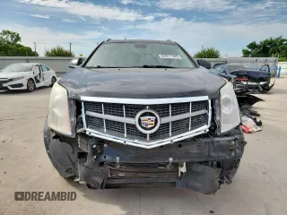2012 Cadillac SRX Premium Collection with VIN 3GYFNCE3XCS596550, listed as a Copart auction lot 63011585 with 98,004 mi miles and Salvage title. Bid and sale history available at DreamBid. Image 5.