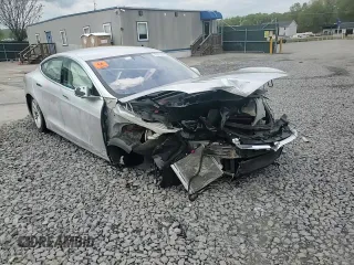 2017 Tesla Model S 60 z VIN 5YJSA1E16HF180191, wystawiony jako Copart lot #55901805 z przebiegiem Nie podano mil oraz Szkoda całkowita • Salvage title. Historia ofert i sprzedaży dostępna na DreamBid. Obrazek 14.