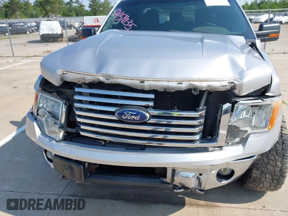 2012 Ford F-150 XL z VIN 1FTFX1ET5CFA28151, wystawiony jako IAAI lot #42457035 z przebiegiem 118 943 mil mil oraz . Historia ofert i sprzedaży dostępna na DreamBid. Obrazek 6.