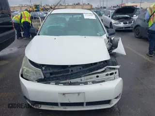 2009 Ford Focus SE z VIN 1FAHP35N19W114402, wystawiony jako IAAI lot #41510501 z przebiegiem Nie podano mil oraz . Historia ofert i sprzedaży dostępna na DreamBid. Obrazek 13.