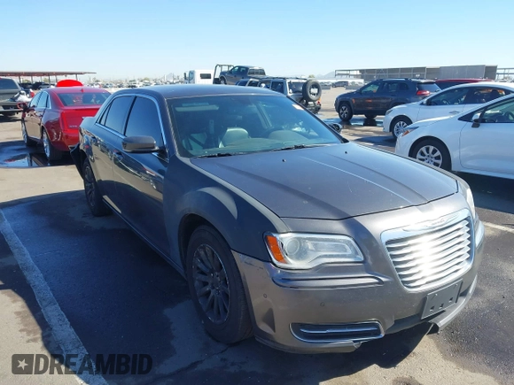 2014 Chrysler 300 with VIN 2C3CCAAG1EH191375, listed as a IAAI auction lot 41867688 with 218,740 mi miles. Bid and sale history available at carsss.com. Image 1.