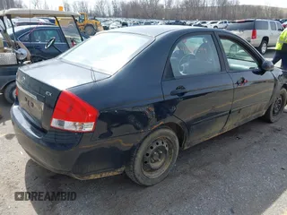 2009 Kia Spectra EX with VIN KNAFE221X95653719, listed as a IAAI auction lot 41945349 with 239,878 mi miles. Bid and sale history available at carsss.com. Image 4.
