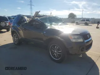 2007 Suzuki Grand Vitara z VIN JS3TE941X74202046, wystawiony jako Copart lot #80221394 z przebiegiem 153 791 mil mil oraz Szkoda całkowita • Salvage title. Historia ofert i sprzedaży dostępna na DreamBid. Obrazek 4.
