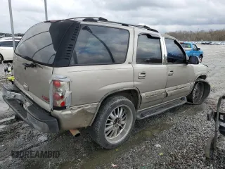 2001 GMC Yukon SLT z VIN 1GKEC13T51J145673, wystawiony jako Copart lot #83568954 z przebiegiem 310 415 mil mil oraz Szkoda całkowita • Salvage title. Historia ofert i sprzedaży dostępna na DreamBid. Obrazek 3.