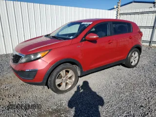 2012 Kia Sportage LX z VIN KNDPBCA21C7308994, wystawiony jako Copart lot #65618445 z przebiegiem 192 653 mil mil oraz Czysty tytuł • Clean title. Historia ofert i sprzedaży dostępna na DreamBid. Obrazek 1.