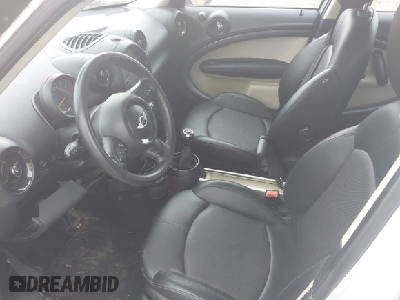 2015 MINI Countryman S with VIN WMWZC5C59FWM18935, listed as a IAAI auction lot 42427878 with 121,410 mi miles and . Bid and sale history available at DreamBid. Image 5.