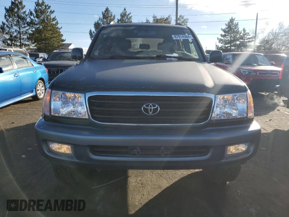 1999 Toyota Land Cruiser with VIN JT3HT05J5X0031805, listed as a Copart auction lot 87014384 with 233,248 mi miles and Clean Title. Bid and sale history available at carsss.com. Image 5.