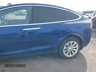 2016 Tesla Model X 70D z VIN 5YJXCAE29GF015890, wystawiony jako IAAI lot #41637564 z przebiegiem 145 848 mil mil oraz . Historia ofert i sprzedaży dostępna na DreamBid. Obrazek 6.