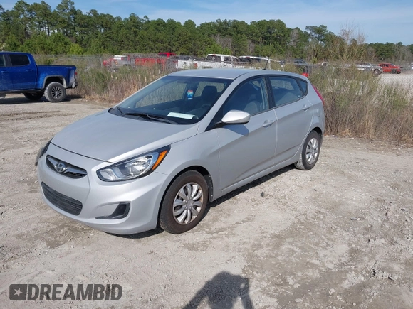 2012 Hyundai Accent GS with VIN KMHCT5AE9CU012569, listed as a IAAI auction lot 41834613 with 131,660 mi miles and . Bid and sale history available at DreamBid. Image 2.