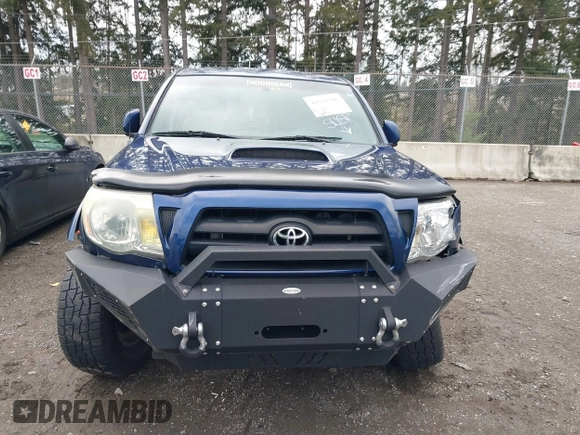 2006 Toyota Tacoma with VIN 5TEUU42N06Z165755, listed as a IAAI auction lot 41619786 with 168,910 mi miles. Bid and sale history available at carsss.com. Image 12.