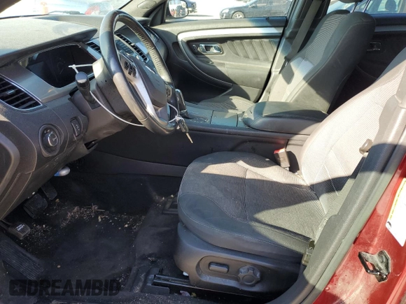 2016 Ford Taurus SEL with VIN 1FAHP2E81GG145161, listed as a Copart auction lot 83750764 with 176,677 mi miles and Salvage Title. Bid and sale history available at DreamBid. Image 7.