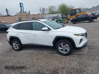 2023 Hyundai Tucson SEL z VIN 5NMJBCAE3PH214971, wystawiony jako IAAI lot #42014930 z przebiegiem 13 025 mil mil oraz . Historia ofert i sprzedaży dostępna na DreamBid. Obrazek 13.