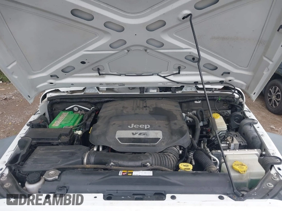 2014 Jeep Wrangler Unlimited Sport with VIN 1C4BJWDG9EL135077, listed as a IAAI auction lot 42324775 with 104,221 mi miles and . Bid and sale history available at DreamBid. Image 10.
