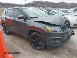 2019 Jeep Compass Latitude with VIN 3C4NJCBB6KT613295, listed as a IAAI auction lot 41678017 with 104,572 mi miles and . Bid and sale history available at DreamBid. Image 1.