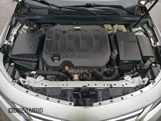 2018 Chevrolet Impala Premier z VIN 2G1125S35J9150253, wystawiony jako Copart lot #82458955 z przebiegiem 111 064 mil mil oraz Szkoda całkowita • Salvage title. Historia ofert i sprzedaży dostępna na DreamBid. Obrazek 13.