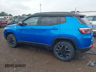 2019 Jeep Compass Trailhawk z VIN 3C4NJDDB6KT760638, wystawiony jako IAAI lot #42634778 z przebiegiem 88 965 mil mil oraz . Historia ofert i sprzedaży dostępna na DreamBid. Obrazek 14.