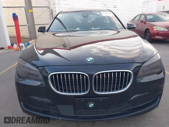 2015 BMW 7 Series 750Li xDrive with VIN WBAYF8C55FD654949, listed as a IAAI auction lot 41659763 with 91,837 mi miles and . Bid and sale history available at carsss.com. Image 12.