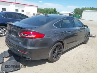 2019 Ford Fusion Titanium with VIN 3FA6P0D9XKR152617, listed as a IAAI auction lot 42209470 with 135,956 mi miles and . Bid and sale history available at DreamBid. Image 4.
