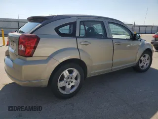 2009 Dodge Caliber SXT z VIN 1B3HB48A19D199410, wystawiony jako Copart lot #55133965 z przebiegiem 141 658 mil mil oraz Szkoda całkowita • Salvage title. Historia ofert i sprzedaży dostępna na DreamBid. Obrazek 3.