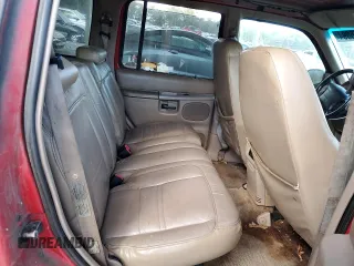 1999 Ford Explorer Eddie Bauer z VIN 1FMDU32X2XZA30166, wystawiony jako Copart lot #77955094 z przebiegiem 212 805 mil mil oraz Szkoda całkowita • Salvage title. Historia ofert i sprzedaży dostępna na DreamBid. Obrazek 10.