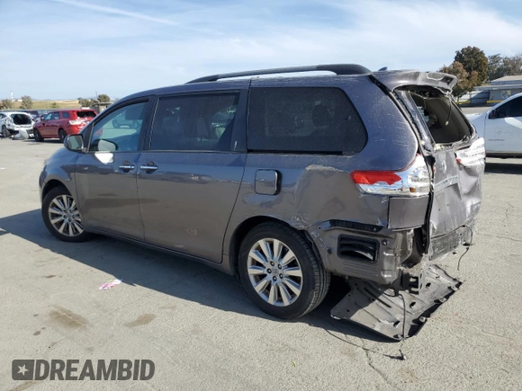 2011 Toyota Sienna XLE AAS with VIN 5TDYK3DC9BS012084, listed as a Copart auction lot 53740365 with 141,440 mi miles and Salvage Title. Bid and sale history available at DreamBid. Image 2.