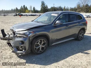 2016 BMW X1 xDrive28i with VIN WBXHT3C39GP882906, listed as a Copart auction lot 52409705 with 57,019 mi miles and Salvage Title. Bid and sale history available at carsss.com. Image 1.