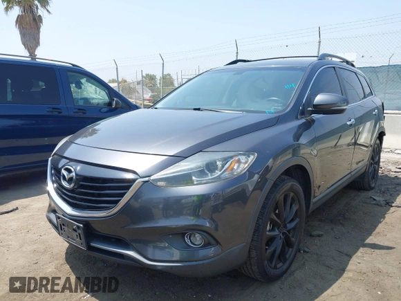 2015 Mazda CX-9 Grand Touring with VIN JM3TB3DA0F0459024, listed as a IAAI auction lot 42452288 with 174,716 mi miles and . Bid and sale history available at DreamBid. Image 17.