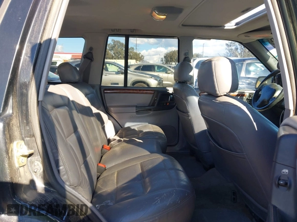 1998 Jeep Grand Cherokee Limited z VIN 1J4GZ78Y3WC105625, wystawiony jako IAAI lot #41742805 z przebiegiem 222 045 mil mil oraz . Historia ofert i sprzedaży dostępna na DreamBid. Obrazek 8.