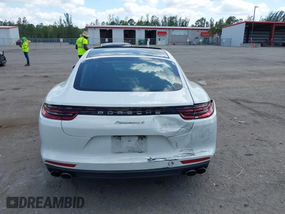 2018 Porsche Panamera 4 E-Hybrid with VIN WP0AE2A74JL130540, listed as a IAAI auction lot 42078444 with 65,981 mi miles and . Bid and sale history available at DreamBid. Image 16.