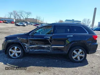 2013 Jeep Grand Cherokee Overland with VIN 1C4RJFCT2DC536899, listed as a IAAI auction lot 41853217 with 1 mi miles. Bid and sale history available at carsss.com. Image 13.
