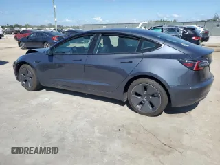 2023 Tesla Model 3 z VIN 5YJ3E1EA0PF407768, wystawiony jako Copart lot #45232555 z przebiegiem 8903 mil mil oraz Nie do naprawy. Historia ofert i sprzedaży dostępna na DreamBid. Obrazek 2.