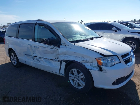 2013 Dodge Grand Caravan Crew with VIN 2C4RDGDG4DR606263, listed as a IAAI auction lot 41898351 with 127,044 mi miles and . Bid and sale history available at DreamBid. Image 6.